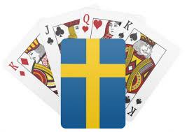 Spelkort och svensk flagga